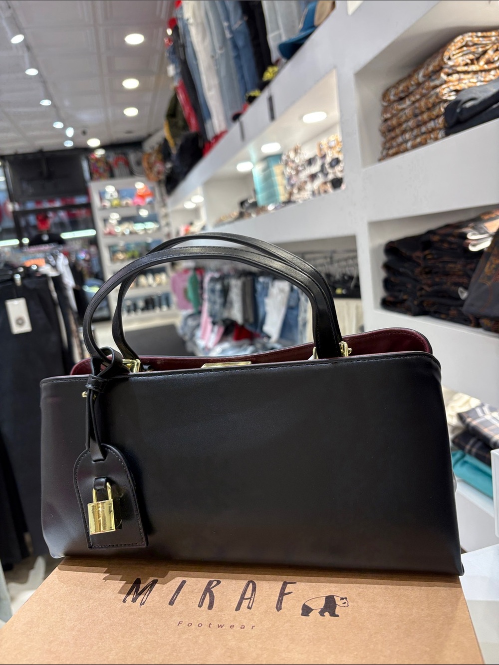 Black Leather Top-Handle Bag with Gold Hardware